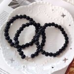 ABR1297-transformed-1 12 PK Cross Connect Faux Pearls Stretch Bracelet