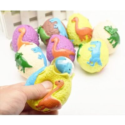 12pk Dinosaur Egg Squeeze Pop Out Toy